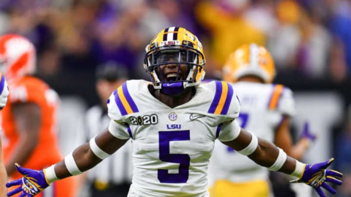 NEW ORLEANS, LOUISIANA – JANUARY 13: Kary Vincent Jr. #5 of the LSU Tigers is pumped after a defensive fumble recovery during the fourth quarter of the College Football Playoff National Championship game against the Clemson Tigers at the Mercedes Benz Superdome on January 13, 2020 in New Orleans, Louisiana. (Photo by Alika Jenner/Getty Images)