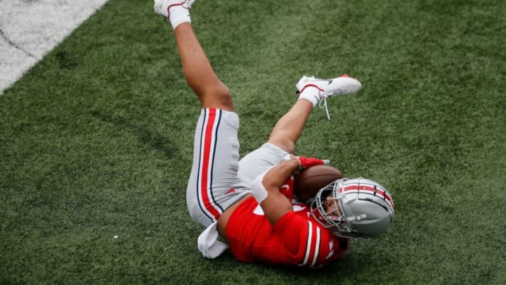 Ohio State Buckeyes wide receiver Jaxson Smith-Njigba (11) slides out of the end zone after scoring a touchdown during the fourth quarter of a NCAA Division I football game between the Ohio State Buckeyes and the Nebraska Cornhuskers on Saturday, Oct. 24, 2020 at Ohio Stadium in Columbus, Ohio.Cfb Nebraska Cornhuskers At Ohio State Buckeyes