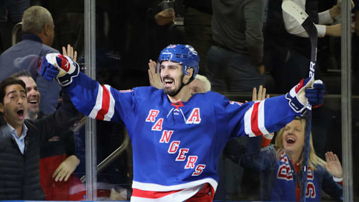 NEW YORK, NEW YORK - NOVEMBER 01: Chris Kreider #20 of the New York Rangers scores the overtime winning goal against Carter Hart #79 of the Philadelphia Flyers at Madison Square Garden on November 01, 2022 in New York City. The Rangers defeated the Flyers 1-0 in overtime. (Photo by Bruce Bennett/Getty Images)