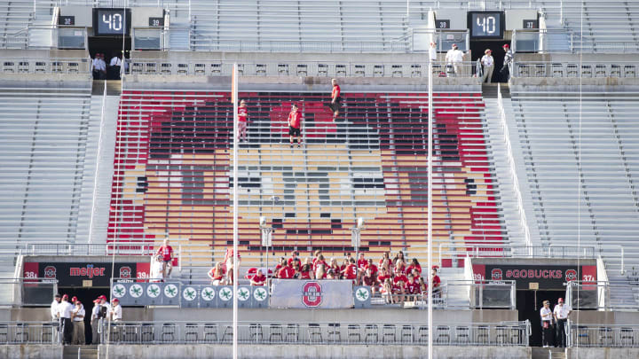 Sep 3, 2016; Columbus, OH, USA; Ohio State Buckeyes fans prepare a display of an animated rendering of former head coach Woody Hayes before the game against the Bowling Green Falcons at Ohio Stadium. Mandatory Credit: Greg Bartram-USA TODAY Sports