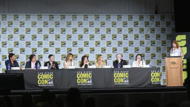 SAN DIEGO, CA - JULY 20: (L-R) Actors Michael Trucco, Aaron Douglas, Tahmoh Penikett, Grace Park, Mary McDonnell, and Tricia Helfer, writers David Eick and Ron Moore, and moderator Maureen Ryan speak onstage at SYFY: "Battlestar Galactica" Reunion during Comic-Con International 2017 at San Diego Convention Center on July 20, 2017 in San Diego, California. (Photo by Mike Coppola/Getty Images)
