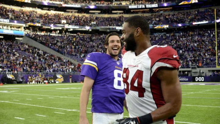 MINNEAPOLIS, MN - NOVEMBER 20: Sam Bradford #8 of the Minnesota Vikings and Jermaine Gresham #84 of the Arizona Cardinals speak after the game on November 20, 2016 at US Bank Stadium in Minneapolis, Minnesota. The Vikings defeated the Cardinals 30-24. (Photo by Hannah Foslien/Getty Images)