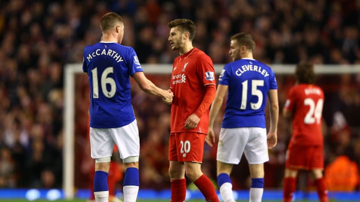 LIVERPOOL, ENGLAND – APRIL 20: Adam Lallana of Liverpool shakes hands with James McCarthy of Everton during the Barclays Premier League match between Liverpool and Everton at Anfield, April 20, 2016, Liverpool, England (Photo by Clive Brunskill/Getty Images)