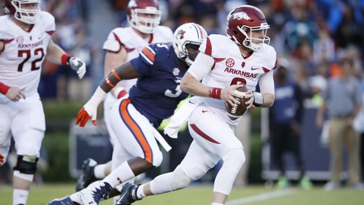 AUBURN, AL – OCTOBER 22: Austin Allen #8 of the Arkansas Razorbacks runs while looking to pass against the Auburn Tigers in the first quarter of the game at Jordan-Hare Stadium on October 22, 2016 in Auburn, Alabama. (Photo by Joe Robbins/Getty Images)