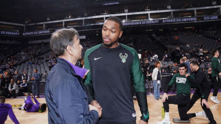 SACRAMENTO, CA - FEBRUARY 27: Sterling Brown #23 of the Milwaukee Bucks shakes hands with owner Vivek Ranadive of the Sacramento Kings on February 27, 2019 at Golden 1 Center in Sacramento, California. NOTE TO USER: User expressly acknowledges and agrees that, by downloading and or using this photograph, User is consenting to the terms and conditions of the Getty Images Agreement. Mandatory Copyright Notice: Copyright 2019 NBAE (Photo by Rocky Widner/NBAE via Getty Images)