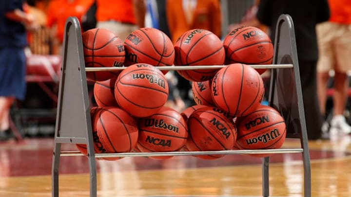 SUNRISE, FL - DECEMBER 21: NCAA basketballs in a rack on the court during the shoot-around proipr to the game between the Florida Gators and the Fresno State Bulldogs during the MetroPCS Orange Bowl Basketball Classic on December 21, 2013 at the BB&T Center in Sunrise, Florida. Florida defeated Fresno State 66-49. (Photo by Joel Auerbach/Getty Images)