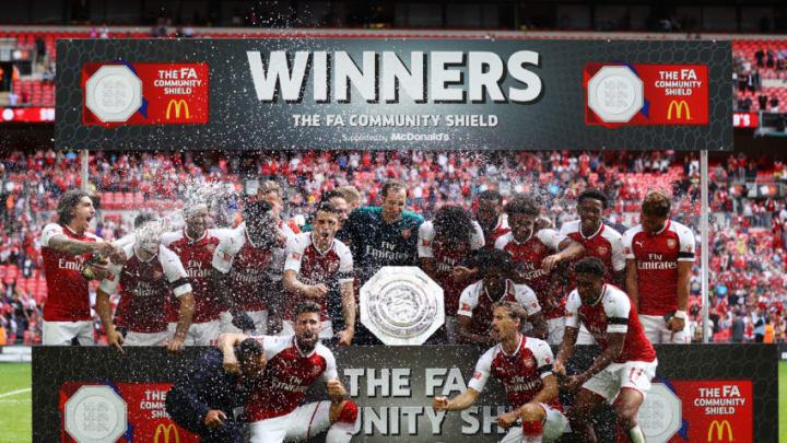 LONDON, ENGLAND - AUGUST 06: Arsenal team celebrate with the trophy following the The FA Community Shield final between Chelsea and Arsenal at Wembley Stadium on August 6, 2017 in London, England. (Photo by Dan Istitene/Getty Images)