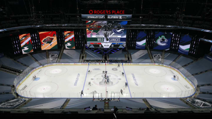 EDMONTON, ALBERTA - AUGUST 02: The Minnesota Wild and the Vancouver Canucks face off in Game One of the Western Conference Qualification Round prior to the 2020 NHL Stanley Cup Playoffs at Rogers Place on August 02, 2020 in Edmonton, Alberta, Canada. (Photo by Jeff Vinnick/Getty Images)