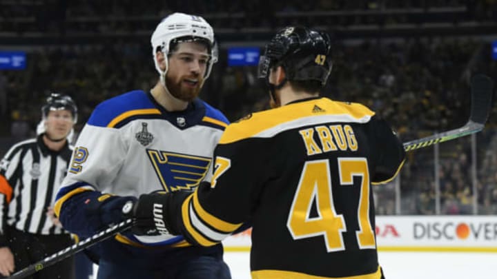 BOSTON, MA - JUNE 6: Torey Krug #47 of the Boston Bruins exchanges words with Zach Sanford #12 of the St Louis Blues during Game Five of the 2019 NHL Stanley Cup Final at the TD Garden on June 6, 2019 in Boston, Massachusetts. (Photo by Brian Babineau/NHLI via Getty Images)