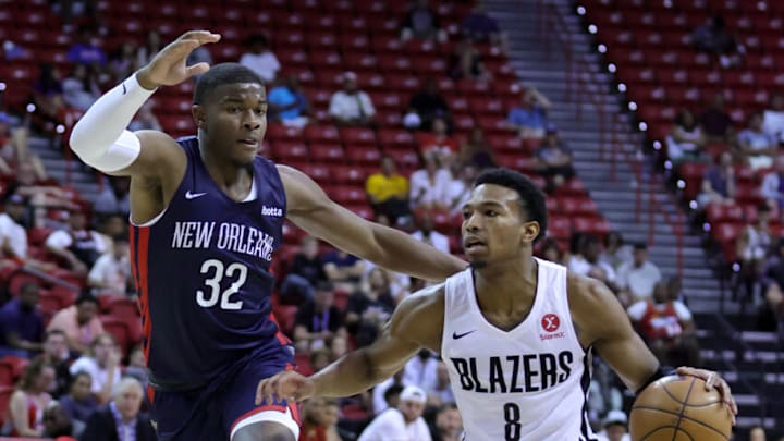LAS VEGAS, NEVADA - JULY 09: Brandon Williams #8 of the Portland Trail Blazers drives against E.J. Liddell #32 of the New Orleans Pelicans during the 2022 NBA Summer League at the Thomas & Mack Center on July 09, 2022 in Las Vegas, Nevada. NOTE TO USER: User expressly acknowledges and agrees that, by downloading and or using this photograph, User is consenting to the terms and conditions of the Getty Images License Agreement. (Photo by Ethan Miller/Getty Images)
