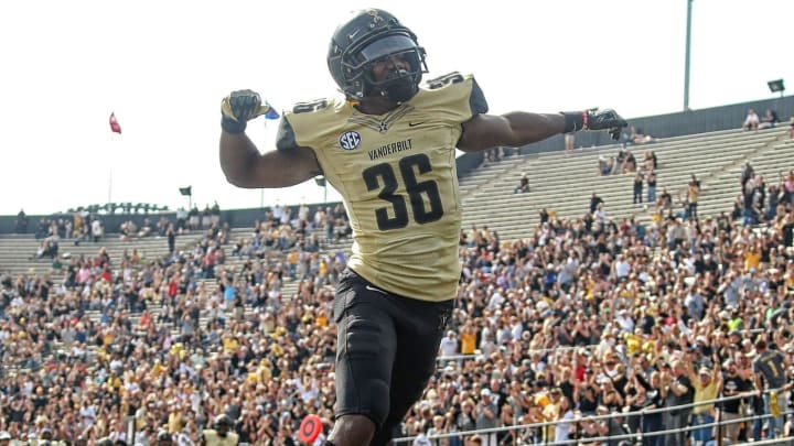 NASHVILLE, TN – NOVEMBER 04: Trey Ellis #36 of the Vanderbilt Commodores celebrates after catching a deflected pass to score a touchdown against the Western Kentucky University Hilltoppers during the first half at Vanderbilt Stadium on November 4, 2017 in Nashville, Tennessee. (Photo by Frederick Breedon/Getty Images)