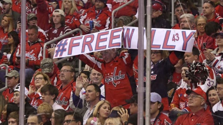WASHINGTON, DC - MAY 05: Washington Capitals fans hold up a sign in reference to the three game suspension of Washington Capitals right wing Tom Wilson (43) on May 5, 2018, at the Capital One Arena in Washington, D.C. in the Second Round of the Stanley Cup Playoffs. The Washington Capitals defeated the Pittsburgh Penguins, 6-3. (Photo by Mark Goldman/Icon Sportswire via Getty Images)