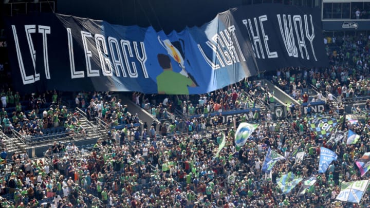SEATTLE, WASHINGTON - JUNE 03: Seattle Sounders supporters cheer before the game against the Portland Timbers at Lumen Field on June 03, 2023 in Seattle, Washington. (Photo by Steph Chambers/Getty Images)