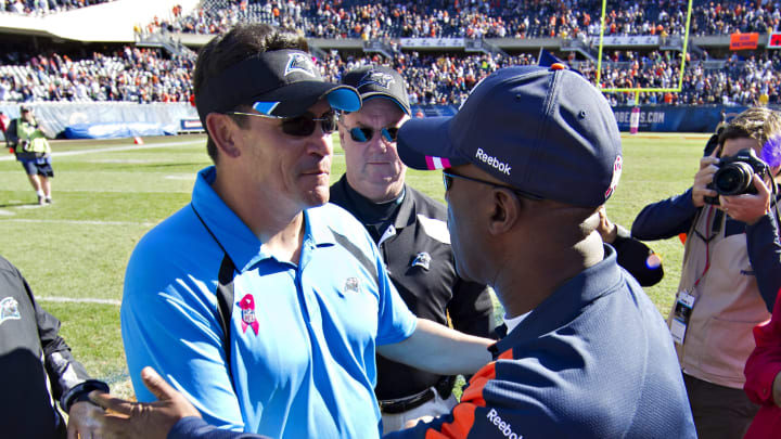 CHICAGO, IL – OCTOBER 2: Head Coach Ron Rivera of the Carolina Panthers and Lovie Smith of the Chicago Bears shake hands after the game at the Soldier Field on October 2, 2011 in Chicago, Illinois. The Bears defeated the Panthers 34 to 29. (Photo by Wesley Hitt/Getty Images)