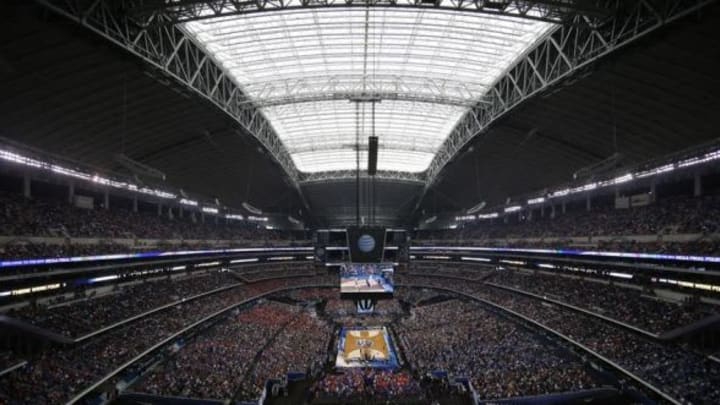 Apr 5, 2014; Arlington, TX, USA; Florida Gators and Connecticut Huskies during the semifinals of the Final Four in the 2014 NCAA Mens Division I Championship tournament at AT&T Stadium. Mandatory Credit: Kevin Jairaj-USA TODAY Sports