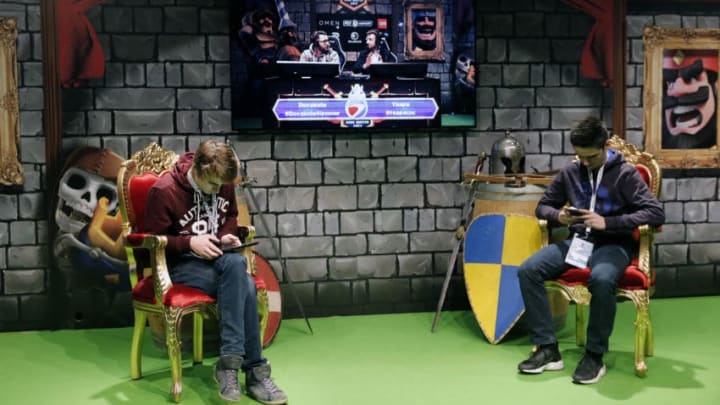 PARIS, FRANCE - FEBRUARY 17: E-Sports players compete a video game 'Clash Royale' developed and published by Supercell during an electronic video game tournament at the eSports World Convention (ESWC) on February 17, 2017 in Paris, France. The ESWC is the historic and emblematic event of electronic sports, bringing together every year since 2003 the best players in the world in video game tournaments designed as real live shows and broadcast live on the Internet or on television. (Photo by Chesnot/Getty Images)