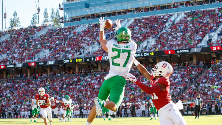 PALO ALTO, CA – SEPTEMBER 21: Jacob Breeland #27 of the Oregon Ducks makes a touchdown reception defended by Kendall Williamson #21 of the Stanford Cardinal during a game between University of Oregon and Stanford Football at Stanford Stadium on September 21, 2019 in Palo Alto, California. (Photo by Bob Drebin/ISI Photos/Getty Images).