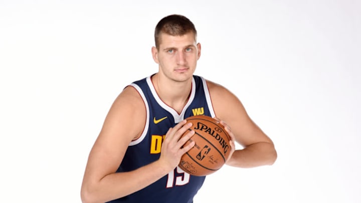 DENVER, CO - SEPTEMBER 24: Nikola Jokic #15 of the Denver Nuggets poses for a portrait during Media Day on September 24, 2018 at the Pepsi Center in Denver, Colorado. NOTE TO USER: User expressly acknowledges and agrees that, by downloading and/or using this Photograph, user is consenting to the terms and conditions of the Getty Images License Agreement. Mandatory Copyright Notice: Copyright 2018 NBAE (Photo by Garrett W. Ellwood/NBAE via Getty Images)