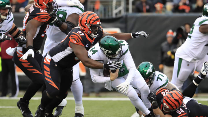 CINCINNATI, OHIO – DECEMBER 01: Sam Darnold #14 of the New York jets is sacked by Geno Atkins #97 and Sam Hubbard #94 of the Cincinnati Bengals at Paul Brown Stadium on December 01, 2019 in Cincinnati, Ohio. (Photo by Andy Lyons/Getty Images)