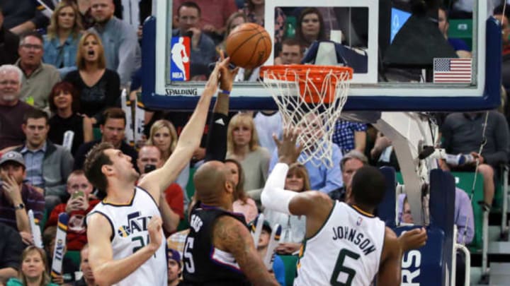 Mar 13, 2017; Salt Lake City, UT, USA; Utah Jazz center Jeff Withey (24) blocks a shot by LA Clippers center Marreese Speights (5) during the fourth quarter at Vivint Smart Home Arena. Utah Jazz won the game 114-108. Mandatory Credit: Chris Nicoll-USA TODAY Sports