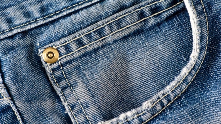 Jeans sometimes have a fake pocket. There are reasons for that, but not they're not necessarily good ones.