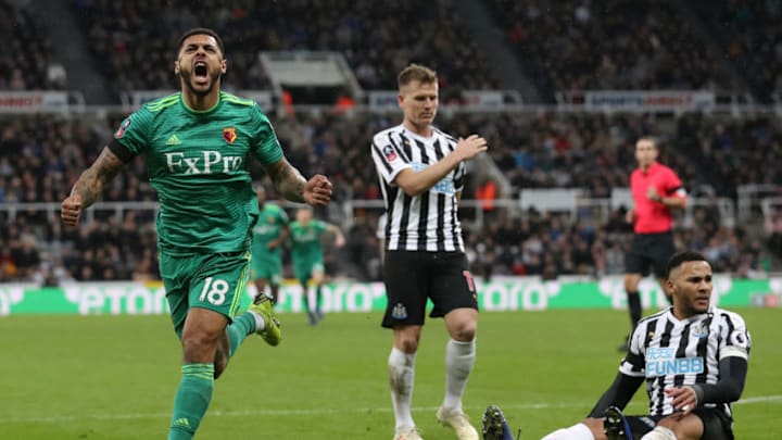 NEWCASTLE UPON TYNE, ENGLAND - JANUARY 26: Andre Gray of Watford celebrates after scoring his team's first goal during the FA Cup Fourth Round match between Newcastle United and Watford at St James' Park on January 26, 2019 in Newcastle upon Tyne, United Kingdom. (Photo by Ian MacNicol/Getty Images)