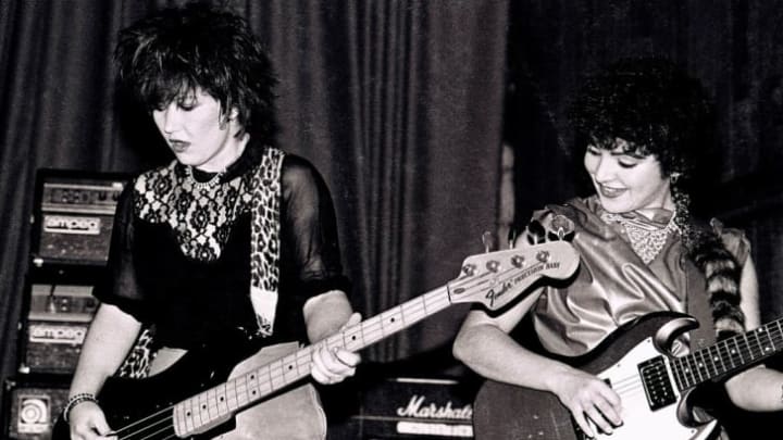 L to R: The Go-Go's Kathy Valentine and Jane Wiedlin perform at The Venue in London in 1981.