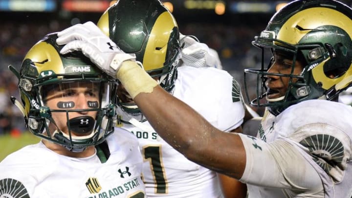 Nov 26, 2016; San Diego, CA, USA; Colorado State Rams wide receiver Robert Ruiz (L) is congratulated by wide receiver Detrich Clark (R) after scoring a touchdown on a punt return against the San Diego State Aztecs during the second quarter at Qualcomm Stadium. Mandatory Credit: Jake Roth-USA TODAY Sports