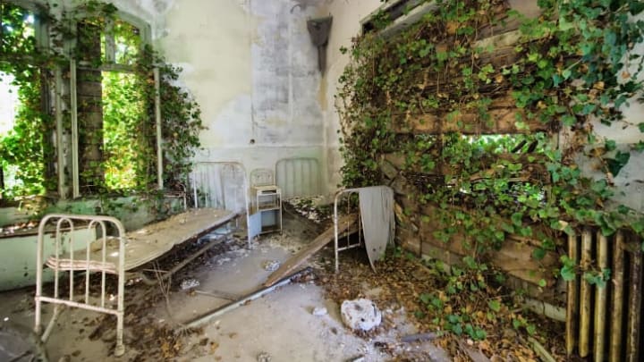 A dormitory in the psychiatric ward of the abandoned Hospital of Poveglia.