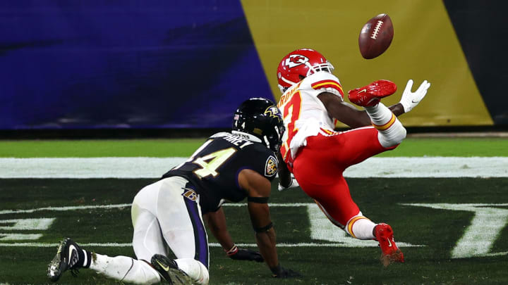 BALTIMORE, MARYLAND – SEPTEMBER 28: Mecole Hardman #17 of the Kansas City Chiefs fails to catch a touchdown pass against Marlon Humphrey #44 of the Baltimore Ravens during the second quarter at M&T Bank Stadium on September 28, 2020 in Baltimore, Maryland. (Photo by Todd Olszewski/Getty Images)