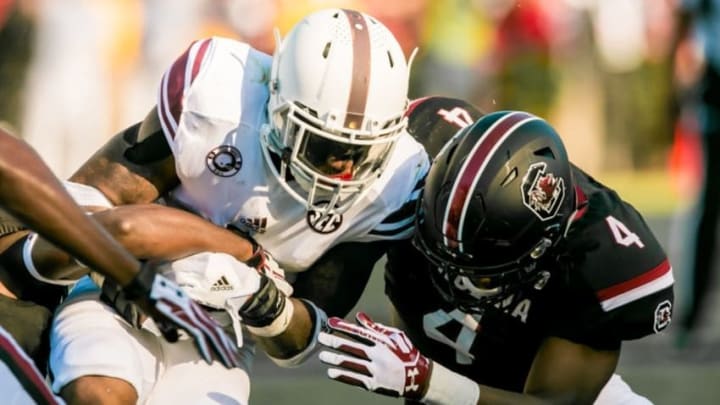 Oct 1, 2016; Columbia, SC, USA; Texas A&M Aggies running back Trayveon Williams (5) is brought down by South Carolina Gamecocks linebacker Bryson Allen-Williams (4) at Williams-Brice Stadium. Mandatory Credit: Jeff Blake-USA TODAY Sports