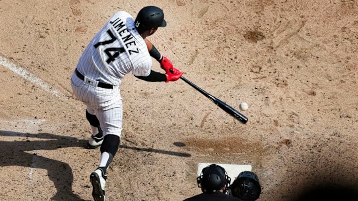 CHICAGO, ILLINOIS - APRIL 06: Eloy Jimenez #74 of the Chicago White Sox hits a single during the sixth inning against the Seattle Mariners at Guaranteed Rate Field on April 06, 2019 in Chicago, Illinois. (Photo by Nuccio DiNuzzo/Getty Images)