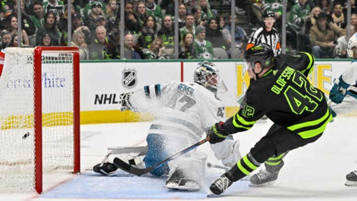 Dec 31, 2022; Dallas, Texas, USA; Dallas Stars left wing Fredrik Olofsson (42) scores his first career NHL goal against San Jose Sharks goaltender James Reimer (47) during the second period at the American Airlines Center. Mandatory Credit: Jerome Miron-USA TODAY Sports