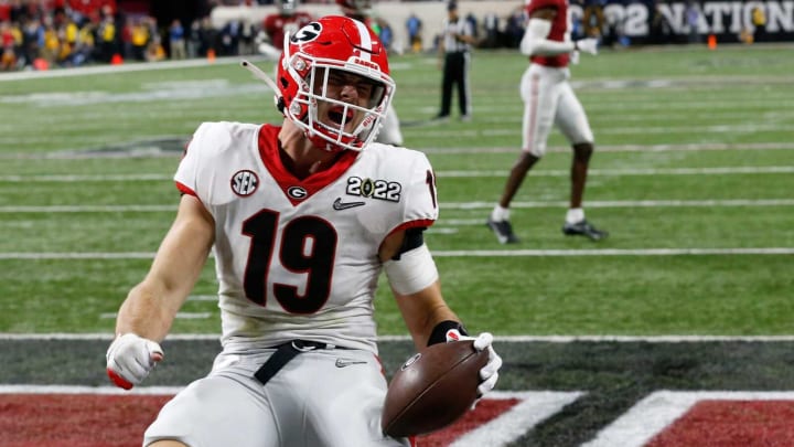 Georgia Bulldogs tight end Brock Bowers (19) celebrates after scoring a touchdown during the College Football Playoff National Championship against Alabama at Lucas Oil Stadium on Jan. 10, 2022, in Indianapolis.