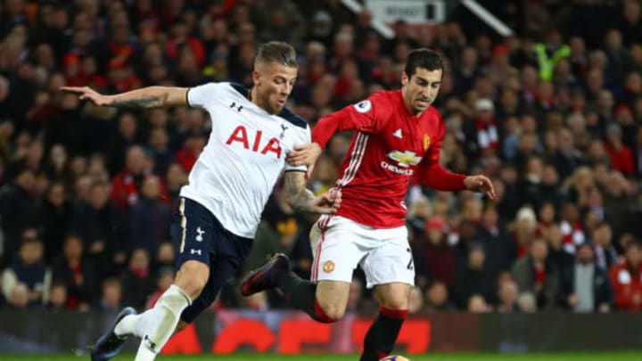 MANCHESTER, ENGLAND – DECEMBER 11: Henrikh Mkhitaryan of Manchester United and Toby Alderweireld of Tottenham Hotspur compete for the ball during the Premier League match between Manchester United and Tottenham Hotspur at Old Trafford on December 11, 2016 in Manchester, England. (Photo by Clive Brunskill/Getty Images)