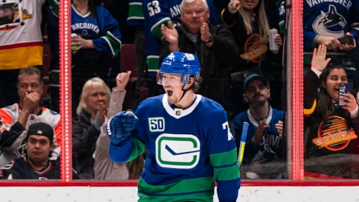 VANCOUVER, BC - FEBRUARY 22: Tyler Toffoli #73 of the Vancouver Canucks celebrates after scoring a goal against the Boston Bruins during NHL action at Rogers Arena on February 22, 2020 in Vancouver, Canada. (Photo by Rich Lam/Getty Images)