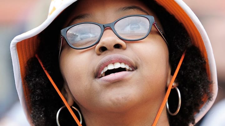 A young Tennessee fan watches from the sidelines at the Orange & White spring game at Neyland Stadium in Knoxville, Tenn. on Saturday, April 24, 2021.Kns Vols Spring Game