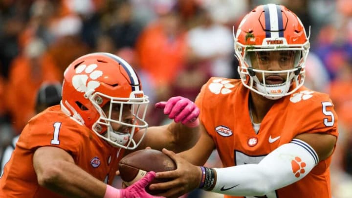 Clemson quarterback D.J. Uiagalelei (5) hands the ball to running back Will Shipley (1) during their game at Memorial Stadium Saturday, Oct. 30, 2021.Jm Clemson 103021 024