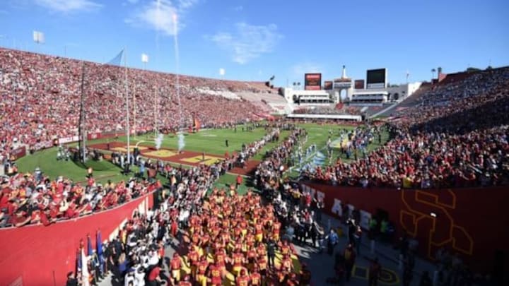 Nov 28, 2015; Los Angeles, CA, USA; General view of the Los Angeles Memorial Coliseum as Southern California Trojans players enter the field before an NCAA football game against the UCLA Bruins. Mandatory Credit: Kirby Lee-USA TODAY Sports