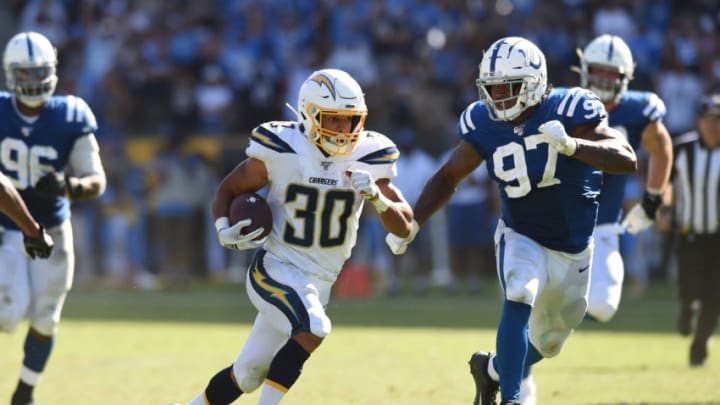 LOS ANGELES, CA - SEPTEMBER 08: Los Angeles Chargers Running Back Austin Ekeler (30) runs the ball for a gain in overtime during an NFL game between the Indianapolis Colts and the Los Angeles Chargers on September 08, 2019, at Dignity Health Sports Park in Los Angeles, CA. (Photo by Chris Williams/Icon Sportswire via Getty Images)