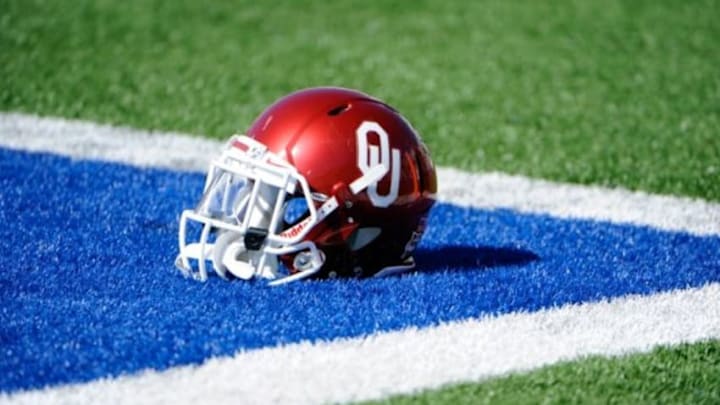 Oct 19, 2013; Lawrence, KS, USA; An Oklahoma Sooners helmet sits on the field before the game against the Kansas Jayhawks at Memorial Stadium. Oklahoma won the game 34-19. Mandatory Credit: John Rieger-USA TODAY Sports