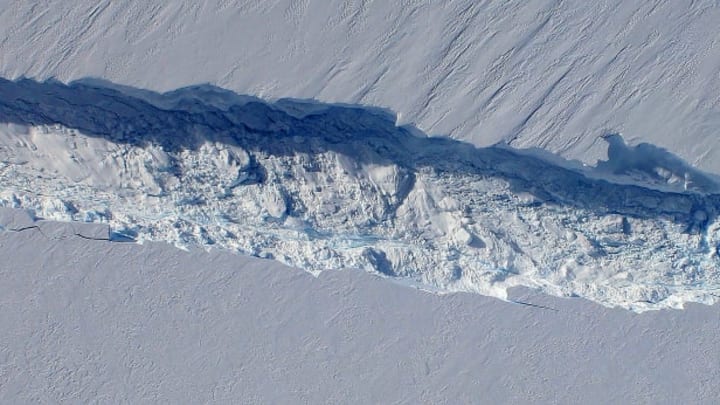 NASA's aerial view of Pine Island Glacier shows a massive crack in the ice filed with huge ice boulders.