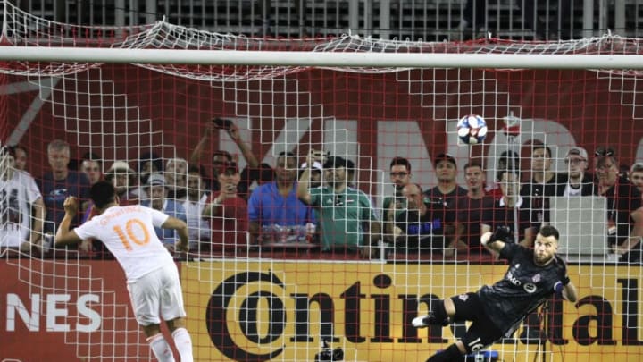 TORONTO, ON - June 26 In second half action, Toronto FC goalkeeper Quentin Westberg (16) keeps his eye on a last second penalty kick by Atlanta United midfielder Gonzalo Martinez (10) that went high and lost Atlanta the game.The Toronto Football Club (TFC) beat the Atlanta United FC 3-2 in MLS soccer action at BMO Field.June 26, 2019 (Richard Lautens/Toronto Star via Getty Images)