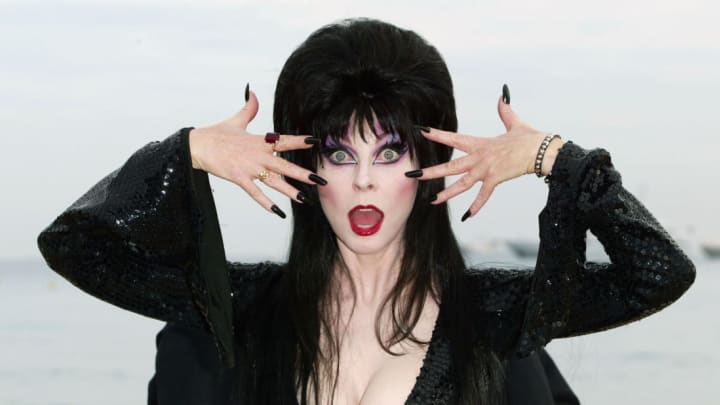 Cassandra Peterson, better known as Elvira, poses during the 2003 Cannes Film Festival.