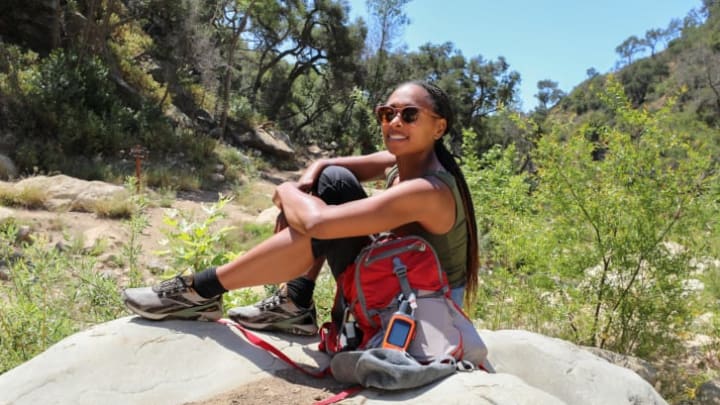 'National Geographic' Explorer and wildlife ecologist Dr. Rae Wynn-Grant wears a pair of shoes from the Reebok x 'National Geographic' collection.