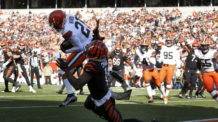 CINCINNATI, OHIO – NOVEMBER 07: Denzel Ward #21 of the Cleveland Browns intercepts the ball thrown by Joe Burrow #9 of the Cincinnati Bengals and returns it for a touchdown during the first quarter at Paul Brown Stadium on November 07, 2021 in Cincinnati, Ohio. (Photo by Kirk Irwin/Getty Images)