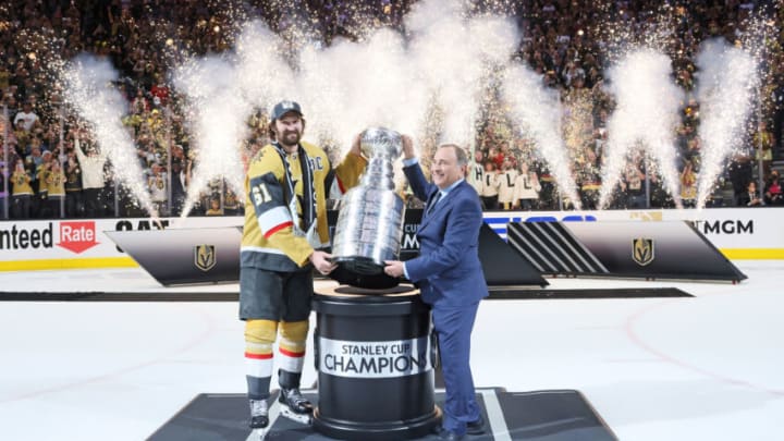 LAS VEGAS, NEVADA - JUNE 13: Commissioner Gary Bettman presents the Stanley Cup to Mark Stone #61 of the Vegas Golden Knights following their victory over the Florida Panthers in Game Five of the 2023 NHL Stanley Cup Final at T-Mobile Arena on June 13, 2023 in Las Vegas, Nevada. (Photo by Bruce Bennett/Getty Images)