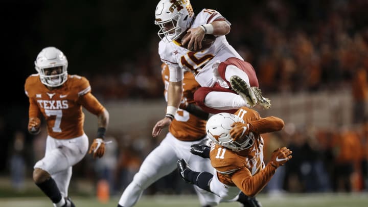 AUSTIN, TX – NOVEMBER 17: Brock Purdy #15 of the Iowa State Cyclones attempts to hurdle P.J. Locke III #11 of the Texas Longhorns in the fourth quarter at Darrell K Royal-Texas Memorial Stadium on November 17, 2018 in Austin, Texas. (Photo by Tim Warner/Getty Images)