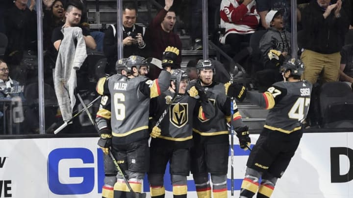 LAS VEGAS, NV – OCTOBER 13: (L-R) Reilly Smith #19, Colin Miller #6, Jonathan Marchessault #81, Oscar Lindberg #24 and Luca Sbisa #47 of the Vegas Golden Knights celebrate after scoring a goal against the Detroit Red Wings during the game at T-Mobile Arena on October 13, 2017 in Las Vegas, Nevada. (Photo by Jeff Bottari/NHLI via Getty Images)