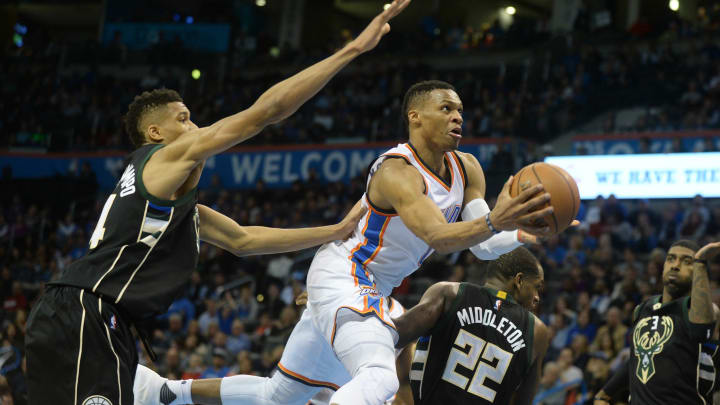 Dec 29, 2015; Oklahoma City, OK, USA; Oklahoma City Thunder guard Russell Westbrook (0) shoots the ball in front of Milwaukee Bucks forward Giannis Antetokounmpo (34) during the fourth quarter at Chesapeake Energy Arena. Mandatory Credit: Mark D. Smith-USA TODAY Sports